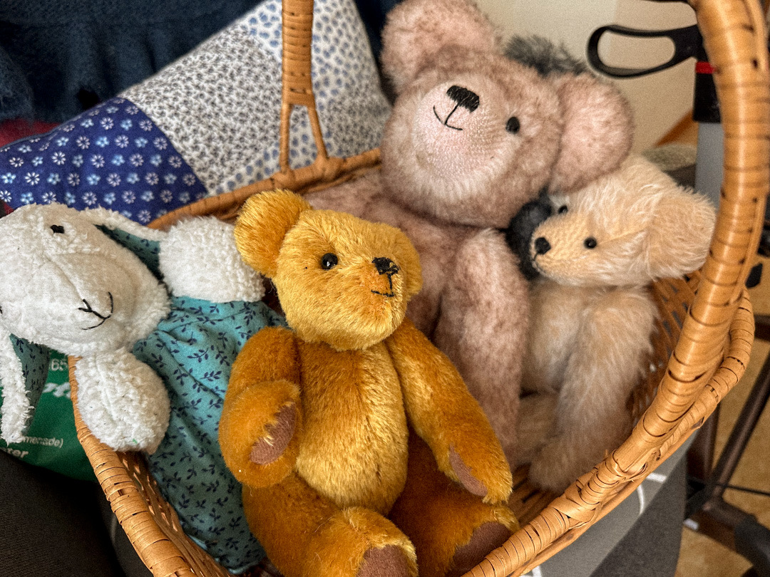 A basket of finished knitted stuffed animals