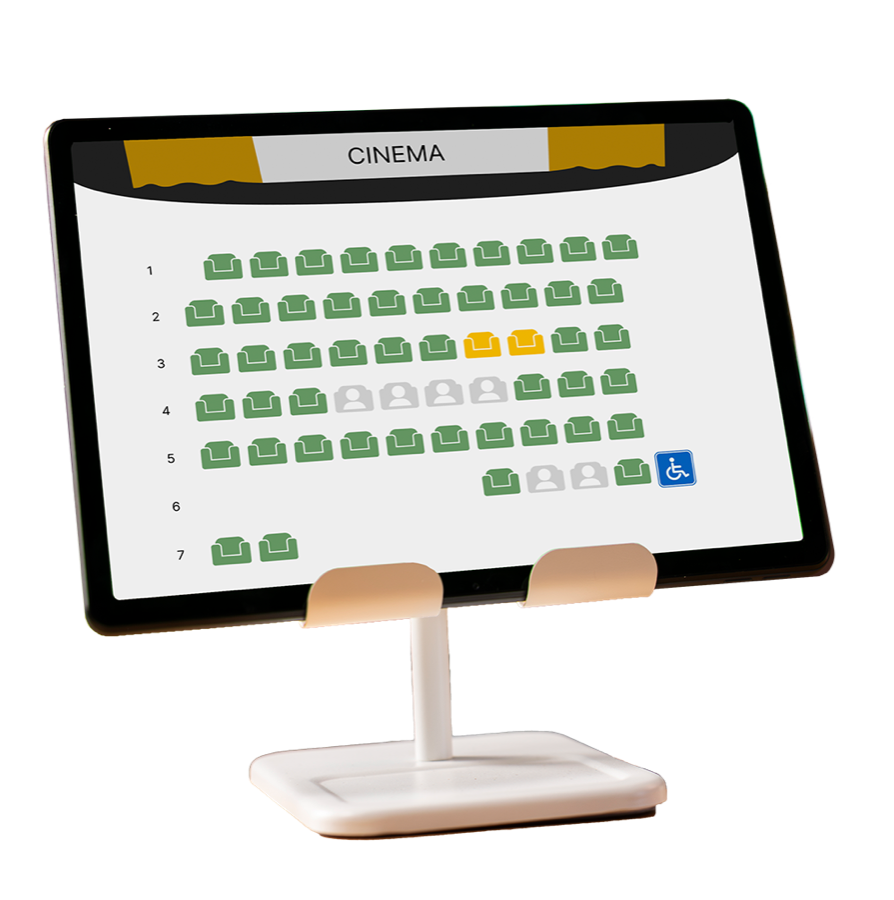 The redesigned seat plan on a cinema counter tablet: available seats in green, two selected seats in yellow, taken seats greyed out, and an accessible seat marked with a wheelchair symbol