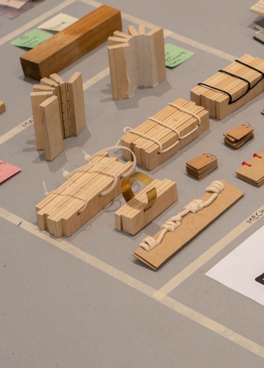 Material and joinery study: plywood offcuts bound with rope, cable ties, and a brass hinge